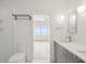 Modern bathroom with double vanity and ocean view at 1579 E Ashley Ave, Folly Beach, SC 29439