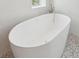 Freestanding oval bathtub in a modern bathroom at 1579 E Ashley Ave, Folly Beach, SC 29439