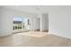 Bedroom with ocean views and access to a deck at 1579 E Ashley Ave, Folly Beach, SC 29439