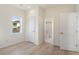 Bedroom with hardwood floors and access to a bathroom at 1579 E Ashley Ave, Folly Beach, SC 29439