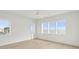 Bright bedroom with ocean views and hardwood floors at 1579 E Ashley Ave, Folly Beach, SC 29439