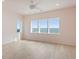 Bright bedroom with ocean views and light hardwood floors at 1579 E Ashley Ave, Folly Beach, SC 29439