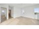 Bright bedroom featuring hardwood floors and ocean views at 1579 E Ashley Ave, Folly Beach, SC 29439