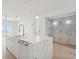 Bright kitchen featuring a marble island and ocean views at 1579 E Ashley Ave, Folly Beach, SC 29439