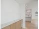 Modern kitchen with light wood cabinets and marble countertops at 1579 E Ashley Ave, Folly Beach, SC 29439