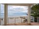 Stunning ocean view from a private deck with wooden flooring at 1579 E Ashley Ave, Folly Beach, SC 29439