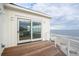 Deck with sliding glass doors offering stunning ocean views at 1579 E Ashley Ave, Folly Beach, SC 29439