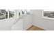 White staircase with metal railing and ocean views at 1579 E Ashley Ave, Folly Beach, SC 29439