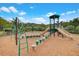 Community playground with playset and climbing equipment at 1879 N James Gregarie Rd, Mount Pleasant, SC 29466