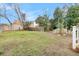 Large backyard with grass area and surrounding fences at 194 Nassau St, Charleston, SC 29403