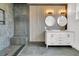 Modern bathroom with double vanity, large shower, and stylish wall accents at 194 Nassau St, Charleston, SC 29403
