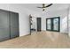 Spacious bedroom with hardwood floors, double doors, and en-suite bathroom at 194 Nassau St, Charleston, SC 29403