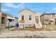 Newly renovated light beige house with white steps and a real estate sign at 194 Nassau St, Charleston, SC 29403