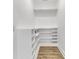 Bright white pantry with ample shelving for storage at 194 Nassau St, Charleston, SC 29403