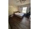 Bedroom with wood floors and a double bed at 206 Palmetto St, Moncks Corner, SC 29461