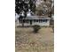 House exterior with green shutters and a yard at 206 Palmetto St, Moncks Corner, SC 29461