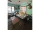 Living room featuring hardwood floors and a vintage sofa at 206 Palmetto St, Moncks Corner, SC 29461