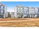 Aerial view of townhouses, gray and beige at 352 Herty Park Dr, Moncks Corner, SC 29461