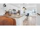 Modern kitchen with granite countertops, white cabinets, and a breakfast bar at 352 Herty Park Dr, Moncks Corner, SC 29461