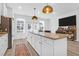 Modern kitchen with white cabinets, granite counters and island at 352 Herty Park Dr, Moncks Corner, SC 29461