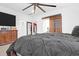 Large main bedroom with a stylish dresser and a barn door leading to the bathroom at 352 Herty Park Dr, Moncks Corner, SC 29461