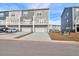 Three townhouses with attached garages and decks at 352 Herty Park Dr, Moncks Corner, SC 29461