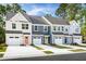 New townhome community with attached garages and modern exterior finishes at 1075 Crescent Cove Ln, Summerville, SC 29483