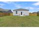 Large backyard with detached shed and wooden fence at 133 Ivory Shadow Rd, Summerville, SC 29486