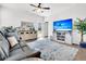 Spacious living area featuring a large TV and comfy seating at 133 Ivory Shadow Rd, Summerville, SC 29486
