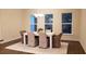 Bright dining room with hardwood floors and large windows at 219 Darby Meadow Ln, Ridgeville, SC 29472