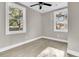 Well-lit bedroom featuring neutral walls and vinyl plank flooring at 2208 Bailey Dr, North Charleston, SC 29405