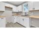 Newly renovated kitchen with white cabinets and wood countertops at 2208 Bailey Dr, North Charleston, SC 29405