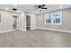 Spacious living room with neutral walls and vinyl plank flooring at 2208 Bailey Dr, North Charleston, SC 29405