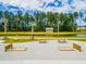 Cornhole pits and picnic tables by the pond at 252 Watersglen Way, Summerville, SC 29486