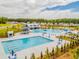 Large community pool with lap lanes and a unique water slide tower at 252 Watersglen Way, Summerville, SC 29486