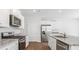 Island kitchen with granite countertops and stainless steel appliances at 278 Watersglen Dr, Summerville, SC 29486