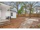 Spacious backyard with a wooden fence and a concrete patio at 31 Allway St, Charleston, SC 29403