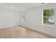 Spacious bedroom with light wood flooring and large windows at 31 Allway St, Charleston, SC 29403