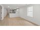Open living area with light hardwood floors and a view into the kitchen at 31 Allway St, Charleston, SC 29403