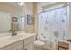 Bathroom with single vanity, toilet, and tub shower at 506 Tranquil Waters Way, Summerville, SC 29486