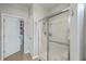 Shower stall with glass enclosure and linen closet at 506 Tranquil Waters Way, Summerville, SC 29486