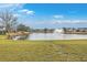 Community pond with fountain and homes at 506 Tranquil Waters Way, Summerville, SC 29486