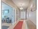 Bright and spacious entryway with tile flooring and a red accent rug at 506 Tranquil Waters Way, Summerville, SC 29486