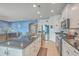 Well-equipped kitchen features granite countertops, white cabinets, and stainless steel appliances at 506 Tranquil Waters Way, Summerville, SC 29486