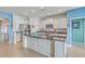 Modern kitchen with white cabinets, granite countertops, and a large island at 506 Tranquil Waters Way, Summerville, SC 29486