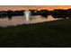 Evening view of pond with fountain at 506 Tranquil Waters Way, Summerville, SC 29486