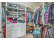 Spacious walk-in closet with shelving and hanging rods at 506 Tranquil Waters Way, Summerville, SC 29486