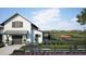 White barn with green roof and picnic area, surrounded by landscaping at 958 Carnes Crossing Blvd, Summerville, SC 29486