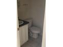 Small bathroom with white vanity and toilet at 5914 Tampa St, Hanahan, SC 29410