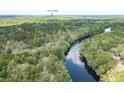 Aerial view showcasing the property's waterfront location and proximity to I-95 at 100 Hannibal Trl, Ridgeville, SC 29472